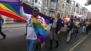 With others holding the Rainbow flag during the 2014    Sunderland Pride parade